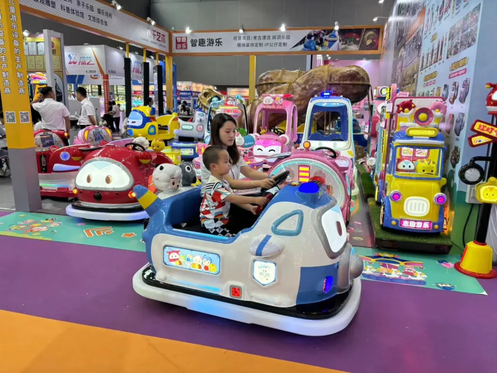 Dodgem bumper cars factory booth at trade fair, showing OEM amusement rides